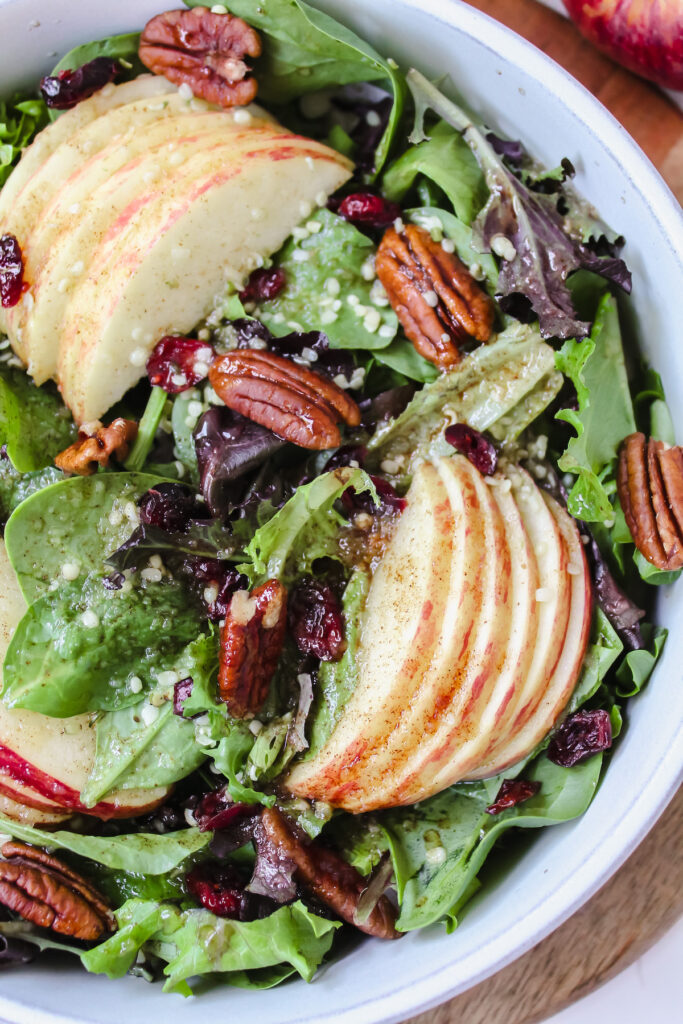 close up shot of salad with dressing