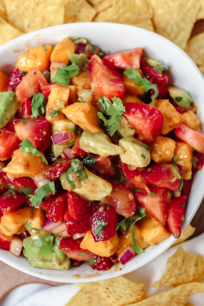 close up of strawberry mango avocado salsa