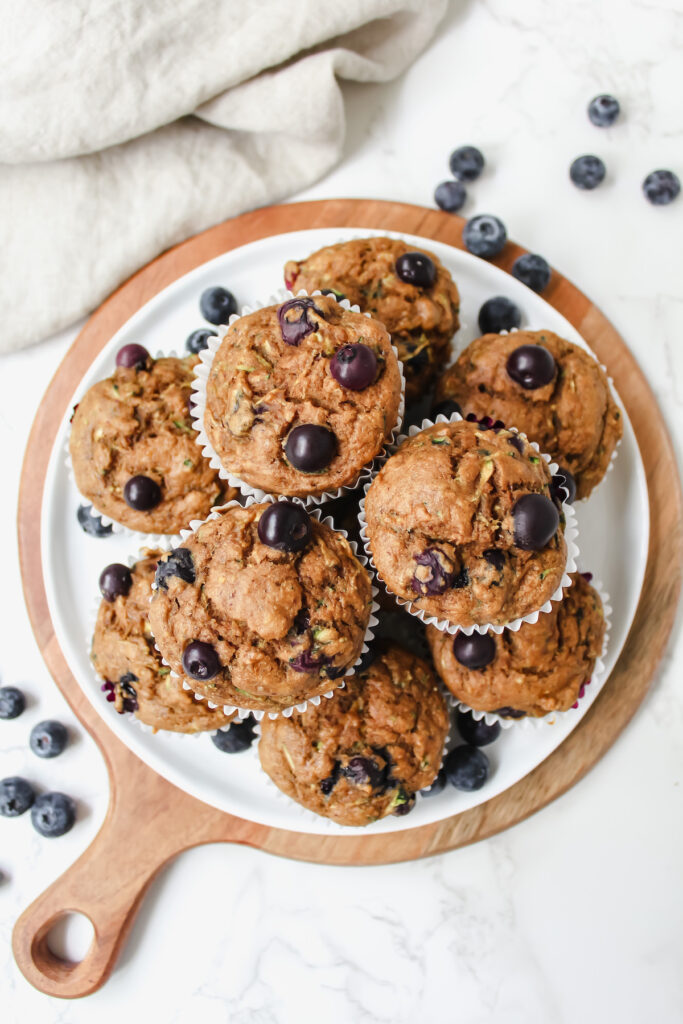 overview of entire plate of banana zucchini blueberry muffins