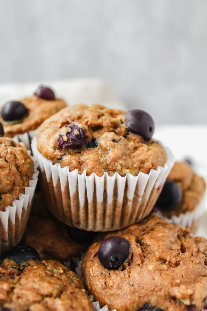 close up of a banana zucchini blueberry muffin