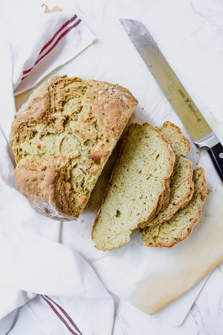 overview shot of Irish soda bread with sliced pieces on the side