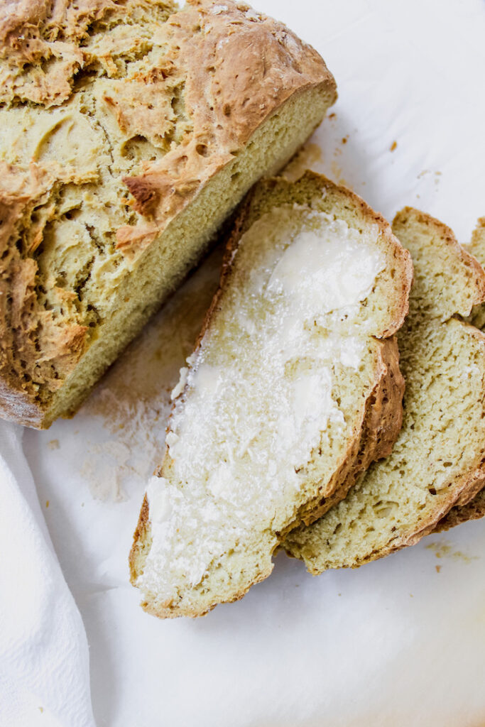 close up of buttered slice of traditional Irish soda bread