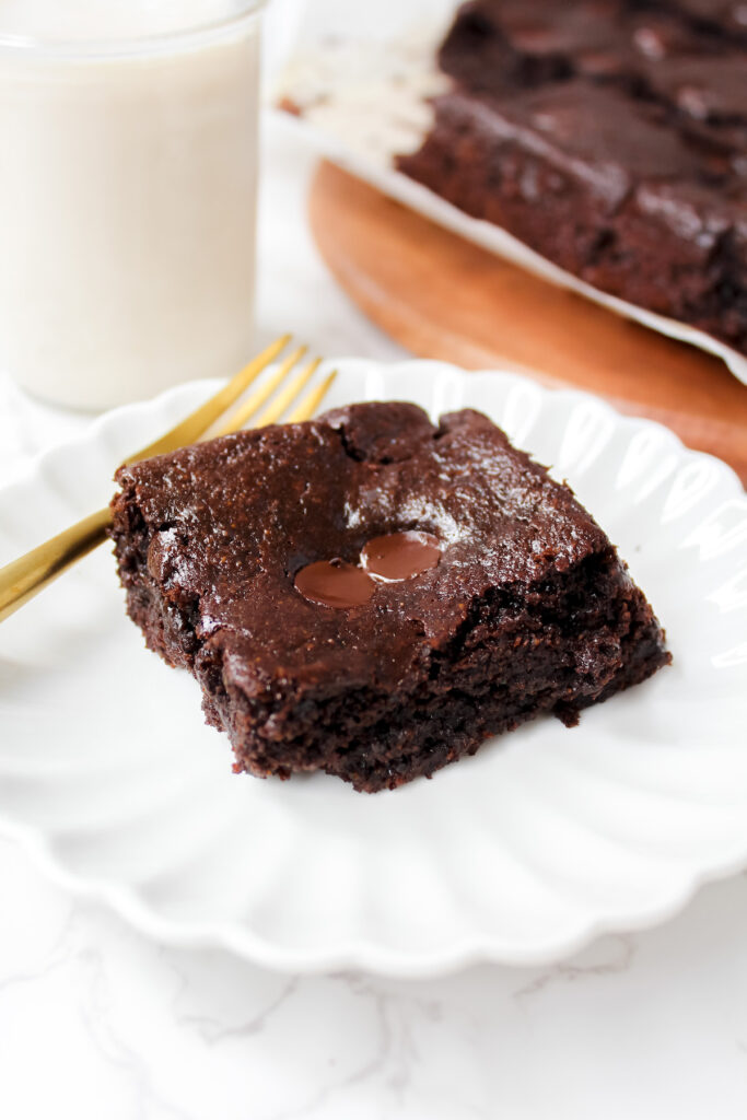 angled shot of slice of brownie on a plate