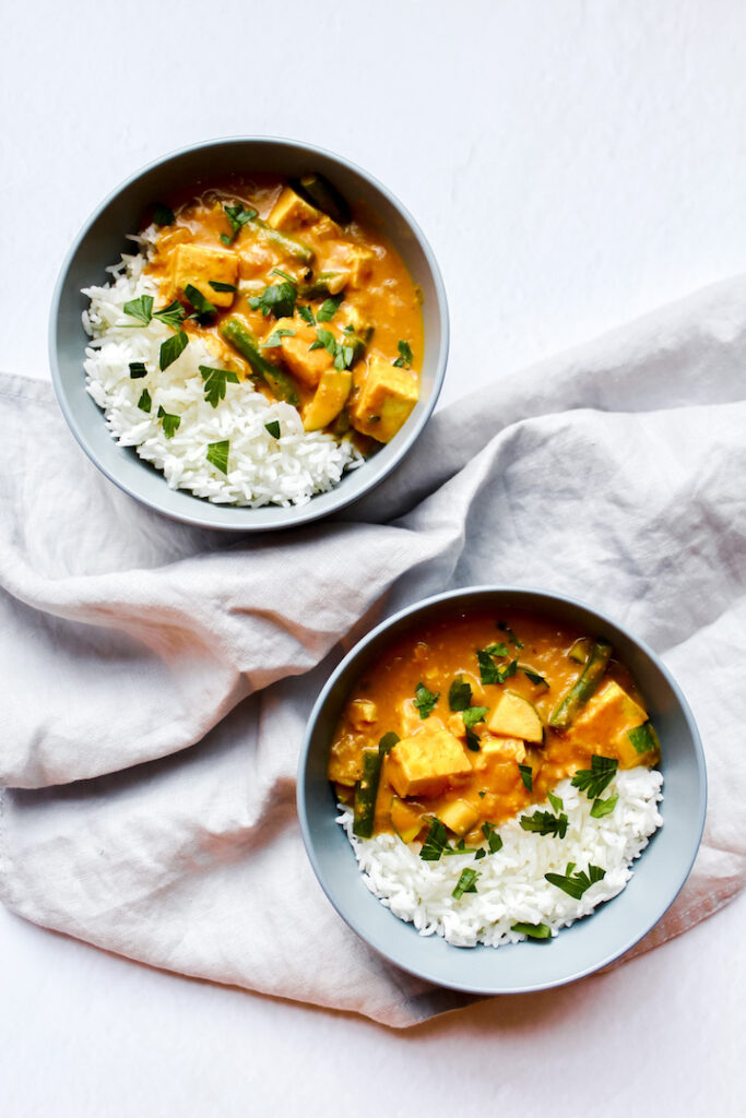 overview shot of two bowls of curry