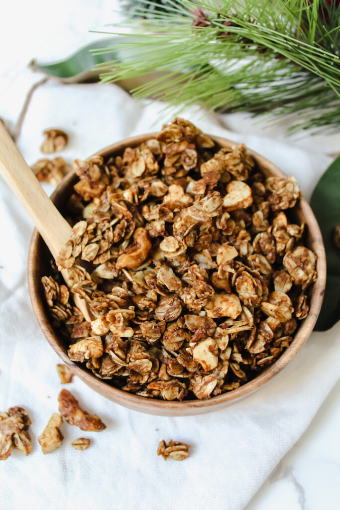 bowl of granola with a wooden spoon