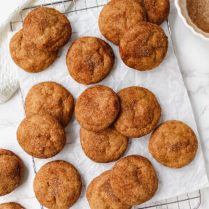 overview shot of sweet potato snickerdoodles on top of a cooling rack