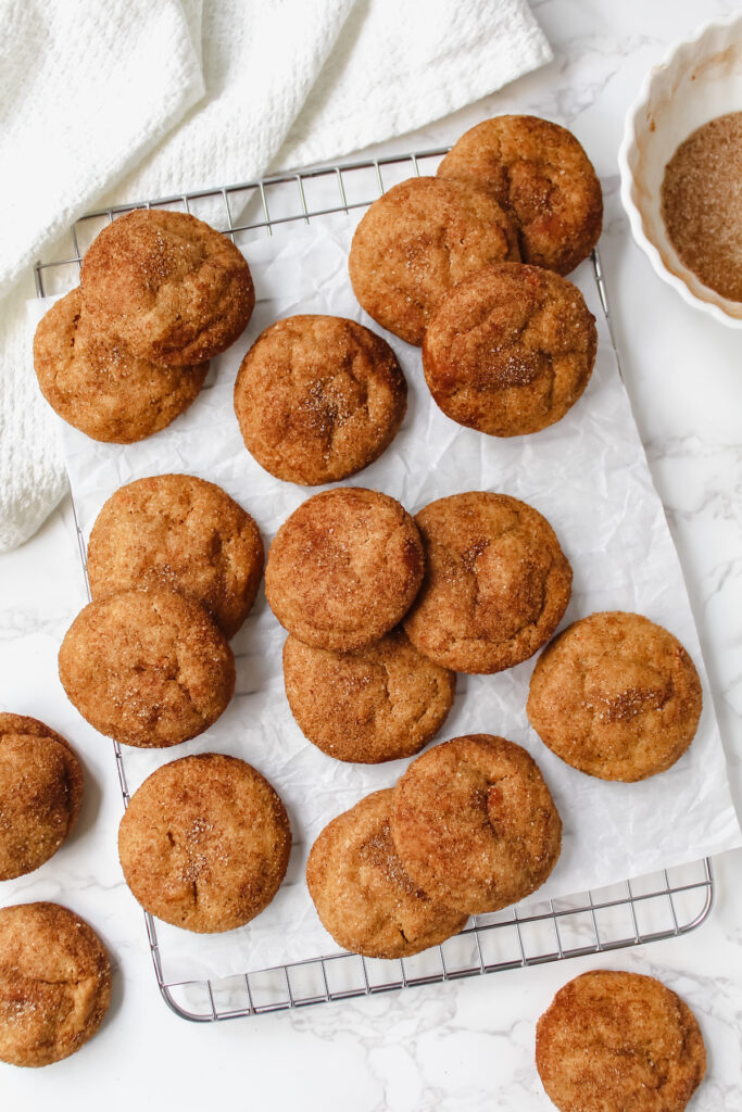 overview shot of sweet potato snickerdoodles on top of a cooling rack