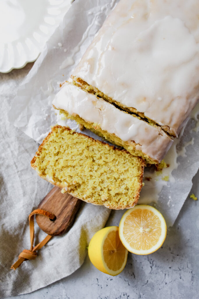 overview shot of vegan starbucks copycat lemon loaf with two slices cut 