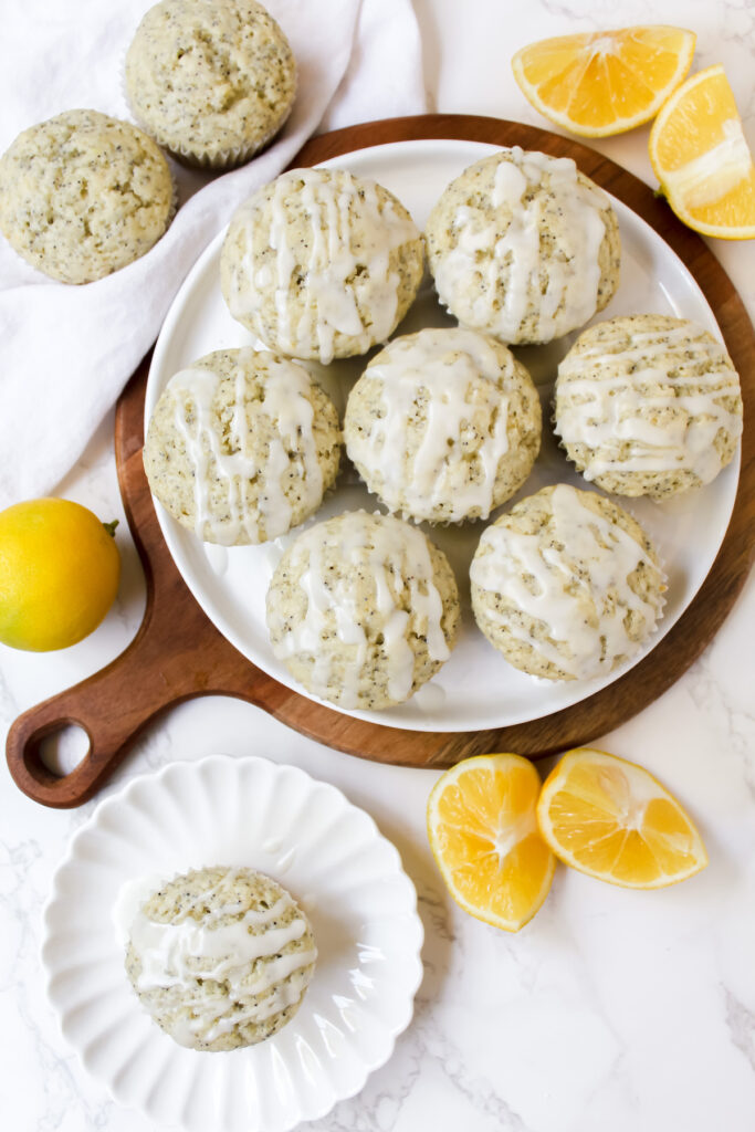 overview shot of muffins on a plate on a wooden board