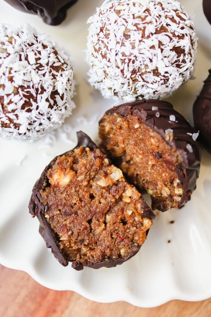 close up shot of a healthy pumpkin pie truffle cut in half