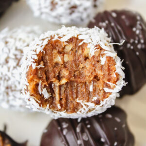 bite shot of a coconut covered truffle