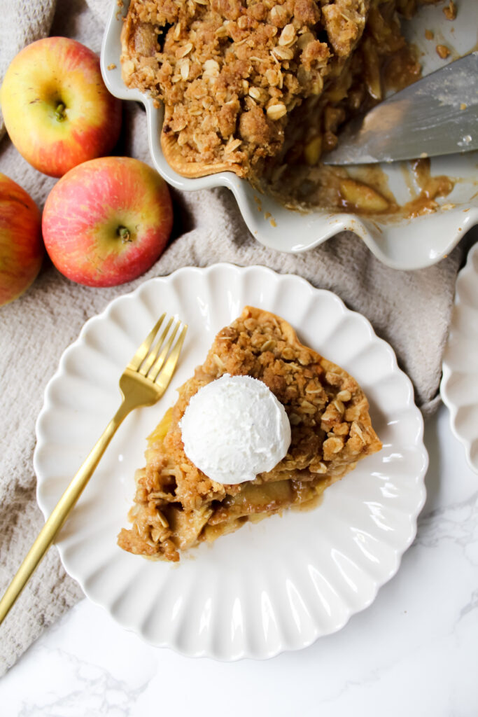 overview shot of a slice of dutch apple pie on a plate