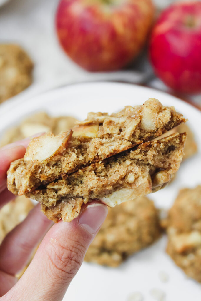 apple pie oatmeal cookie broken in half with inside texture showing