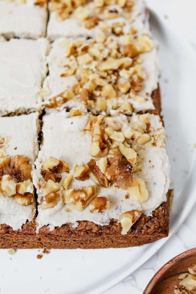 angled shot of sliced carrot cake