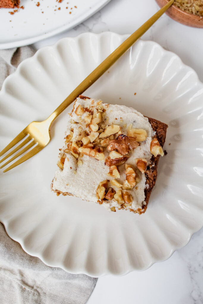 overview shot of a slice of carrot cake on a plate