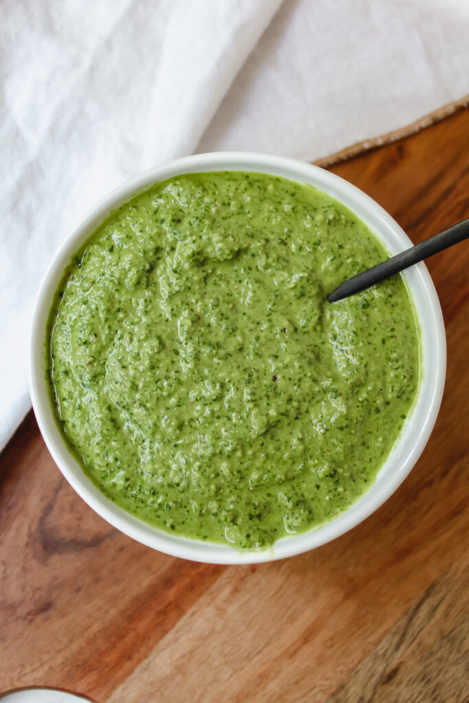 overview shot of a bowl of the best vegan basil pesto