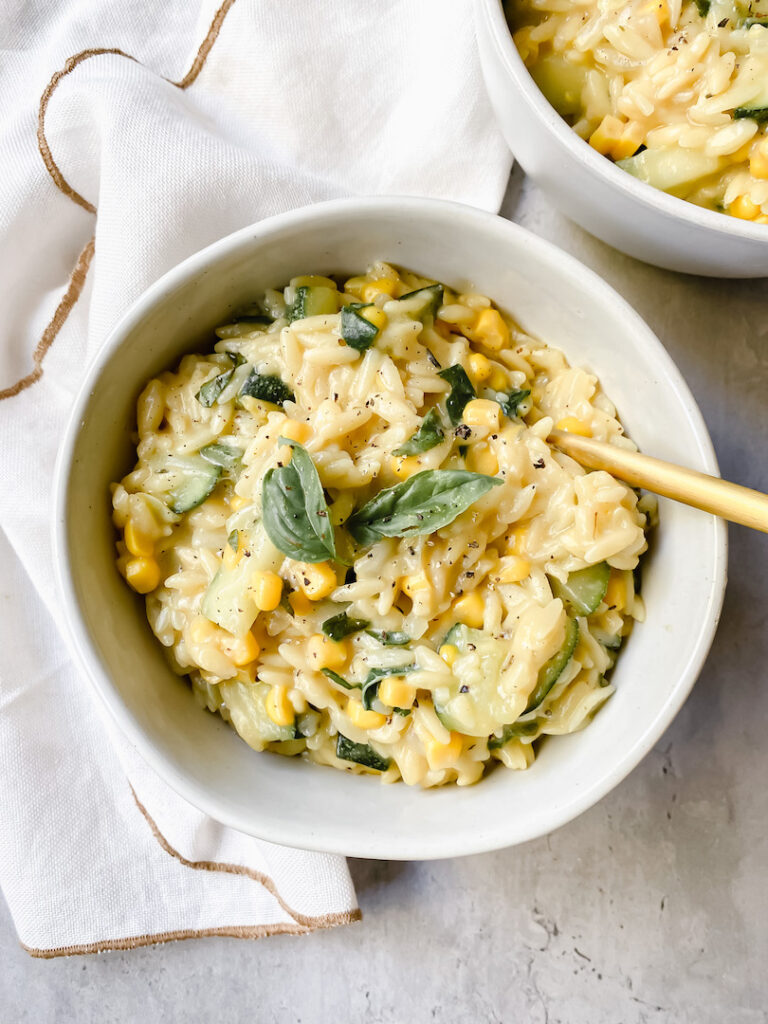 top shot of the creamy corn and zucchini orzo