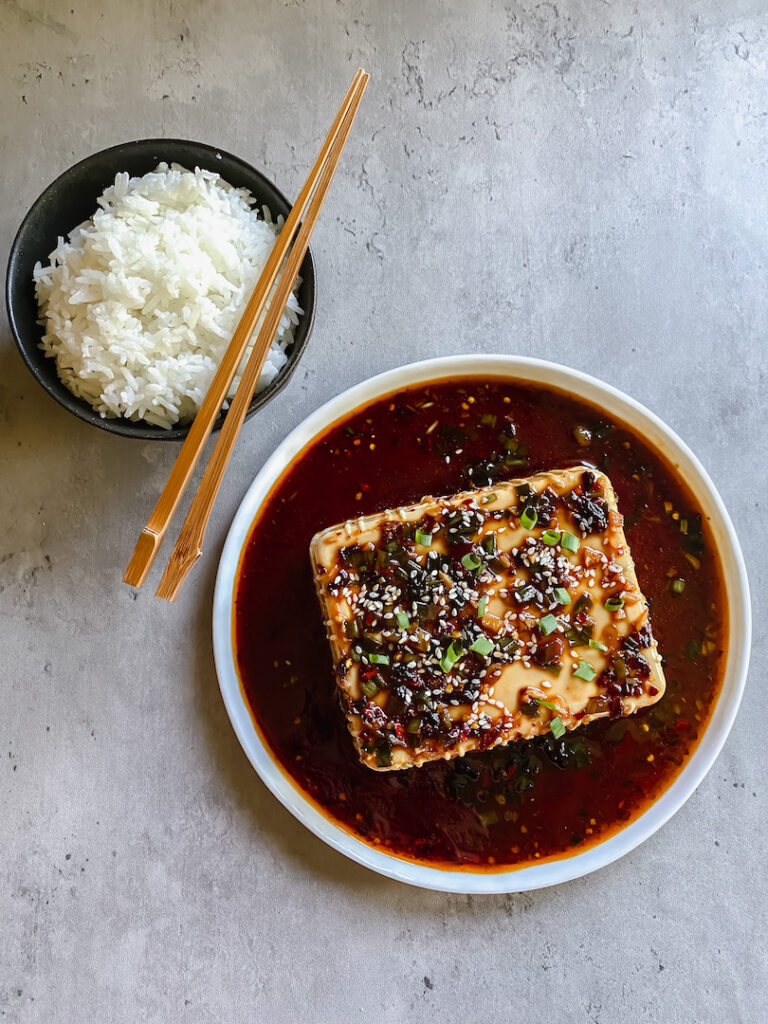 silken tofu with garlic onion soy sauce and rice photo