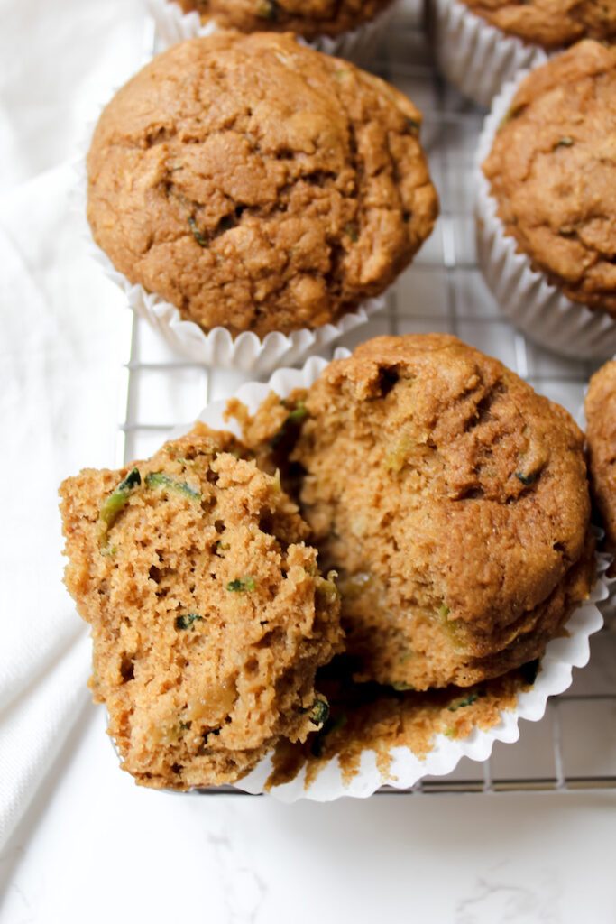 whole wheat zucchini bread muffin broken in half