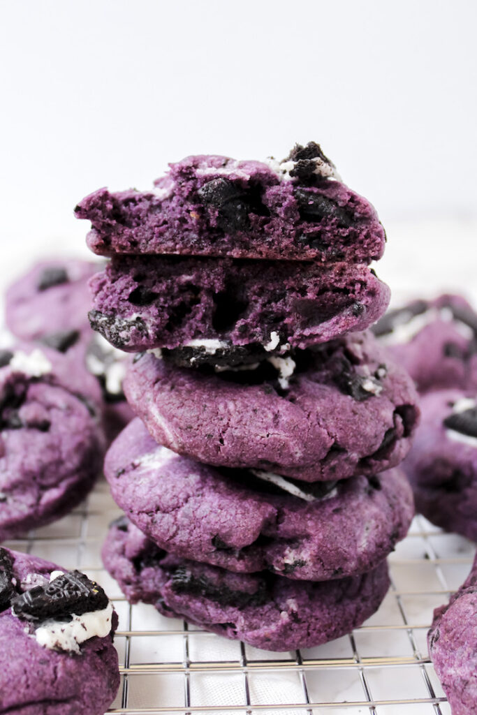 stack of cookies with one cookie broken in half