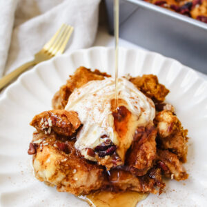 maple syrup being poured onto french toast