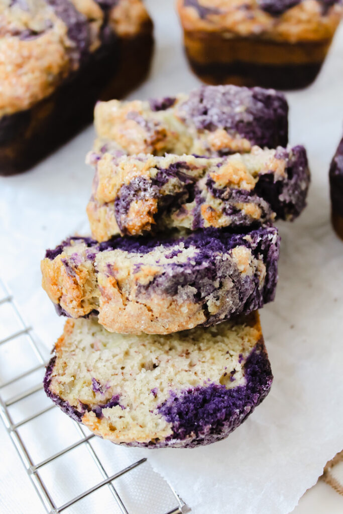 sliced marbled ube mini banana bread in a line