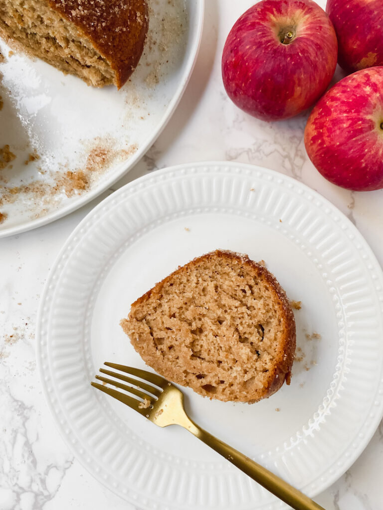 close up picture of slice of apple cider donut bundt cake