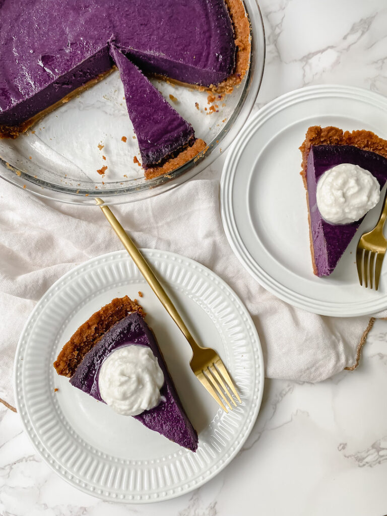 overview shot of slices of pie served on plates