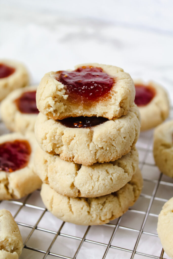 stack of almond flour thumbprint cookies 