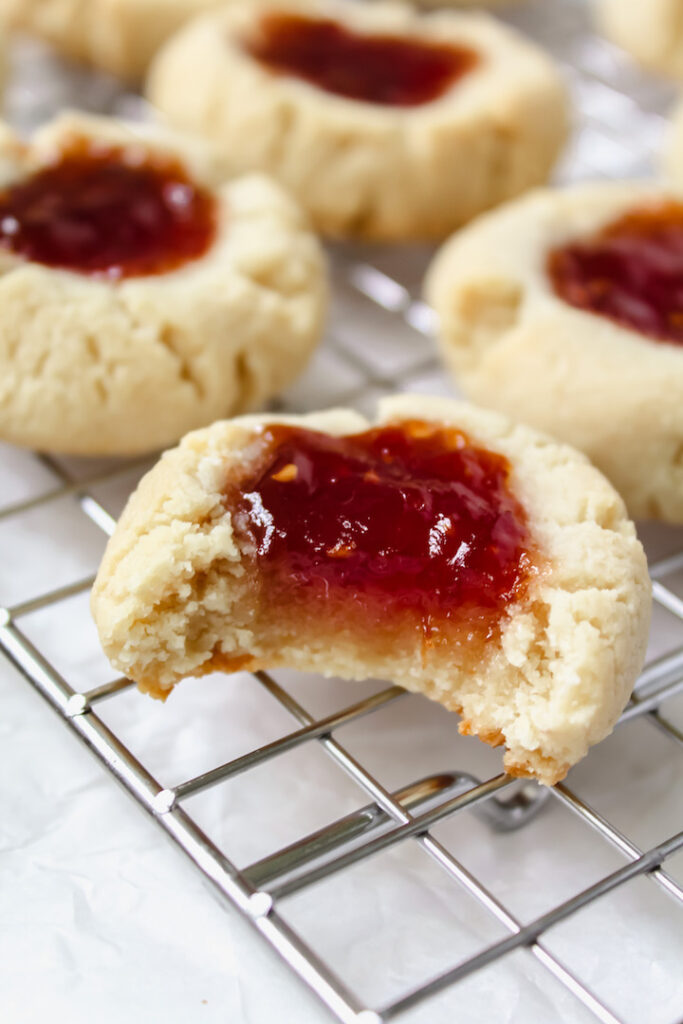 close up of thumbprint cookie with a bite taken out