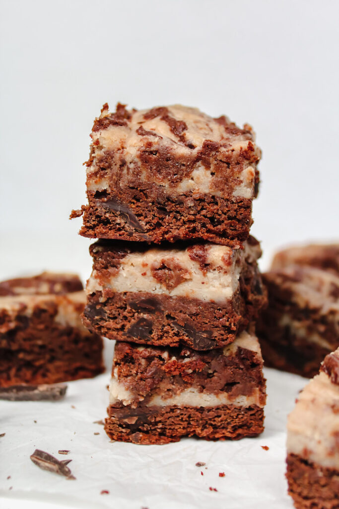 stack of strawberry cheesecake swirl brownies