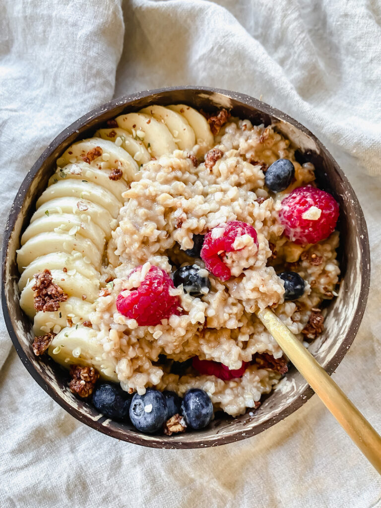 bowl of oats mixed up with toppings