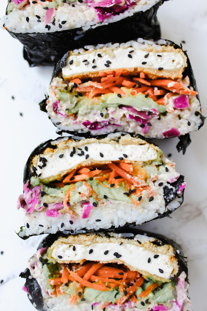 close up of sushi sandwiches cut in half