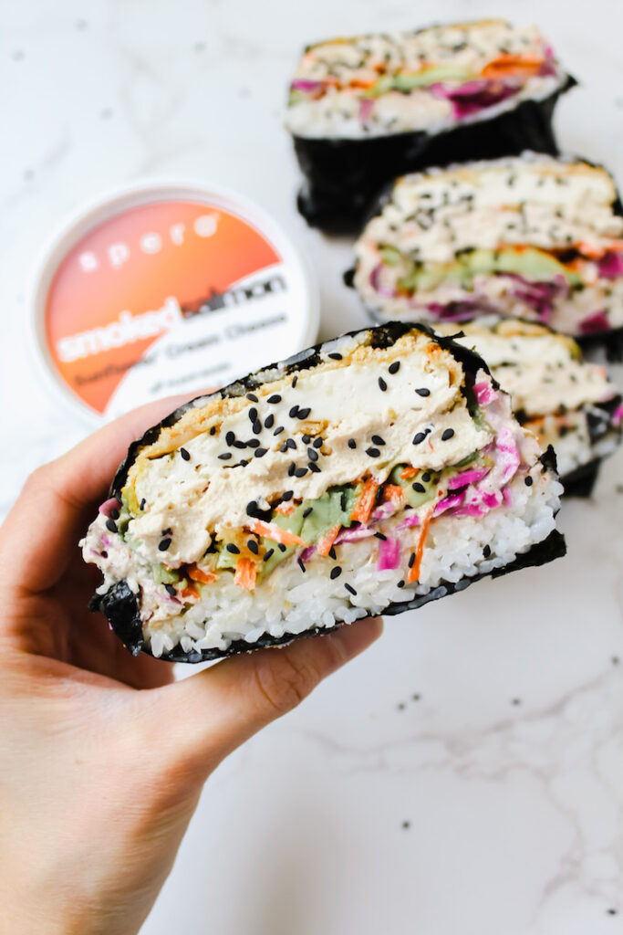 hand holding a vegan sushi sandwich