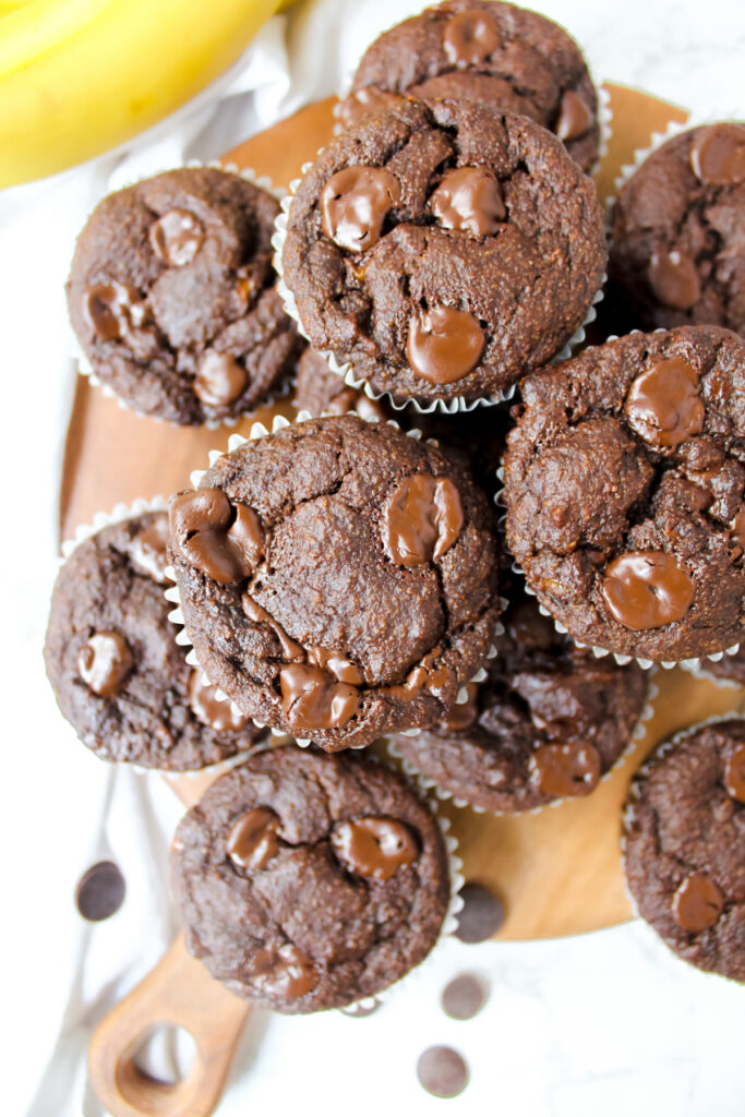 overview shot of muffins on a wooden board