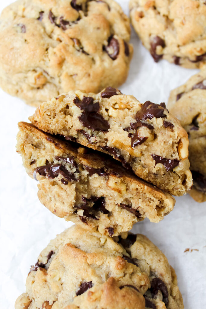 inside shot of two halves of vegan copycat Levain Bakery chocolate chip cookie