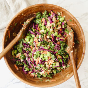 overview shot of edamame crunch salad in a wooden bowl