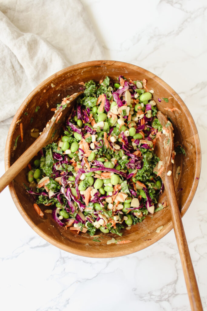 overview shot of edamame crunch salad in a wooden bowl