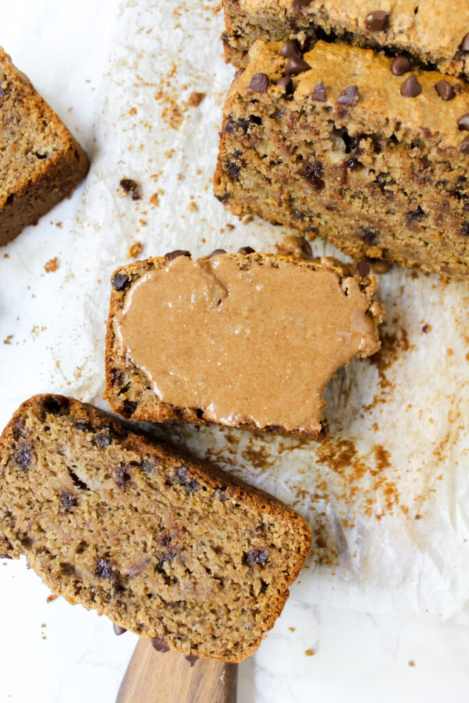 slice of banana bread with granola butter on top