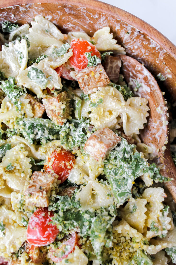 overview shot of one portion of the pasta salad in a bowl