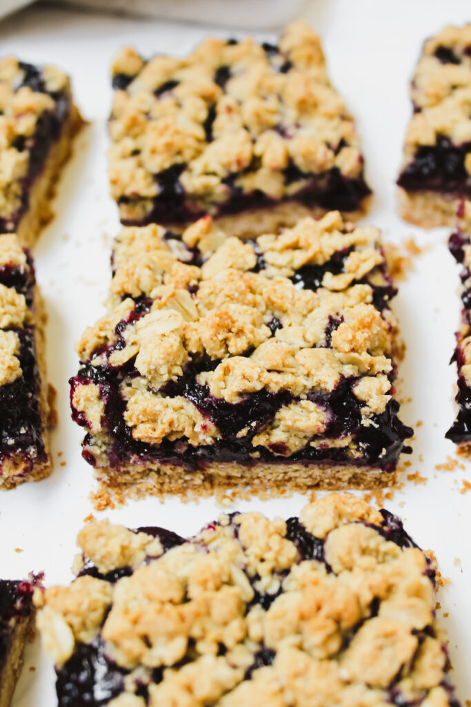 angled shot of berry crumble bars sliced