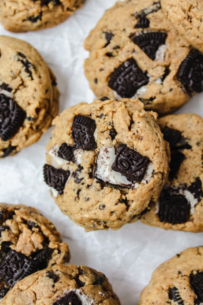 a cookie leaning against other cookies