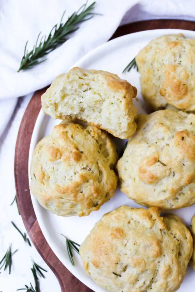 biscuits on a plate with one biscuit cut in half