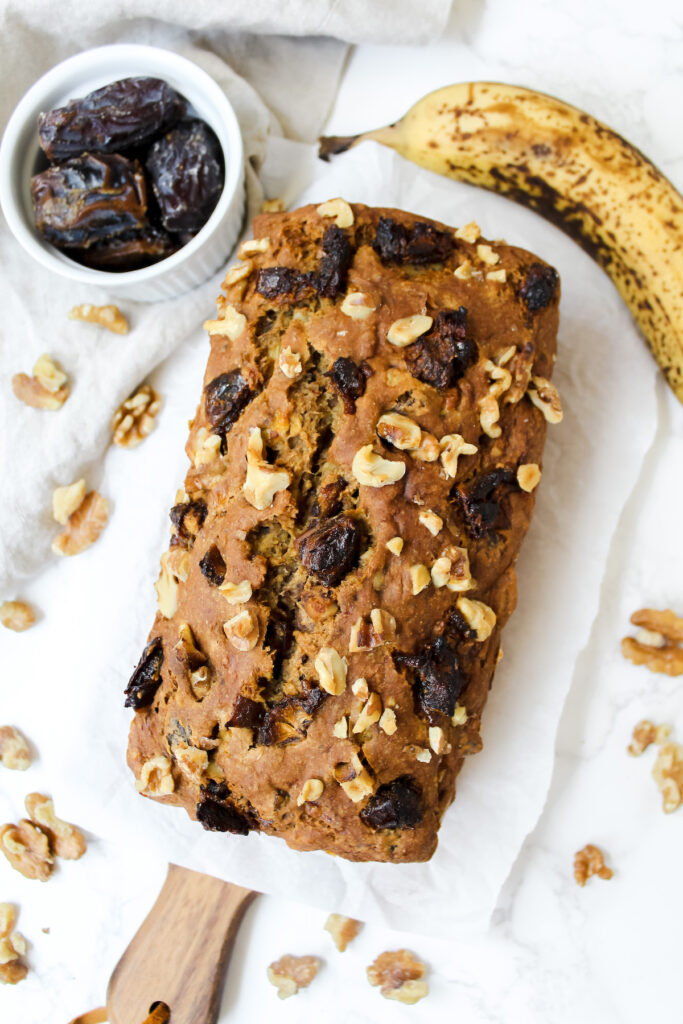 overview shot of the entire loaf of banana date nut bread