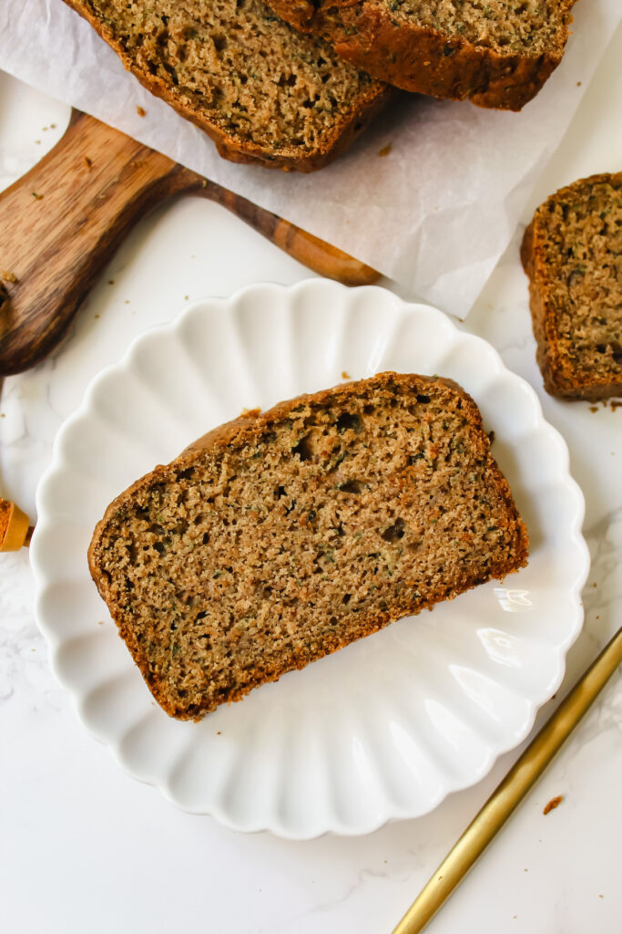 a slice of zucchini bread on a plate