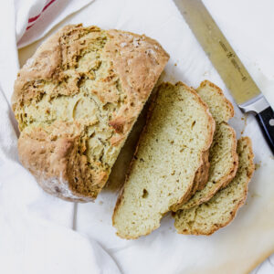 overview shot of Irish soda bread with sliced pieces on the side