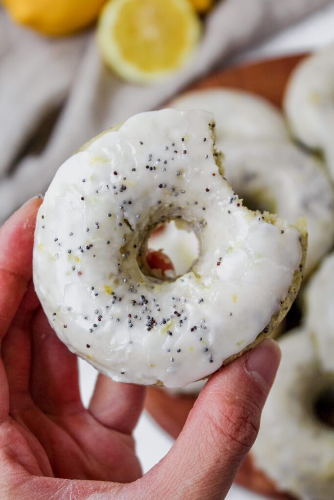 hand holding a donut