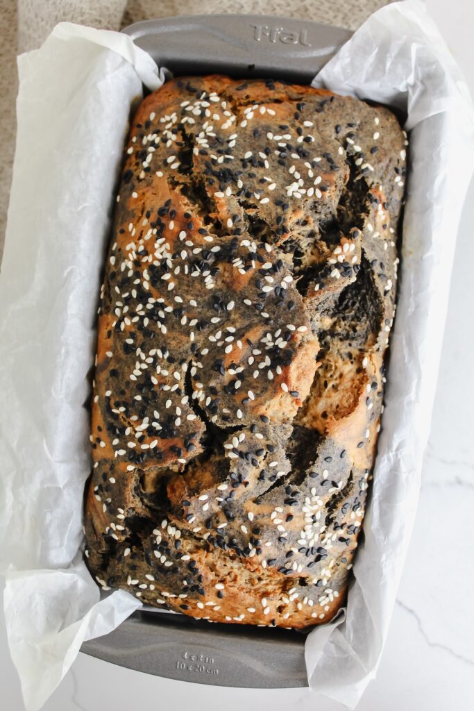 overview shot of marbled black sesame banana bread in loaf pan