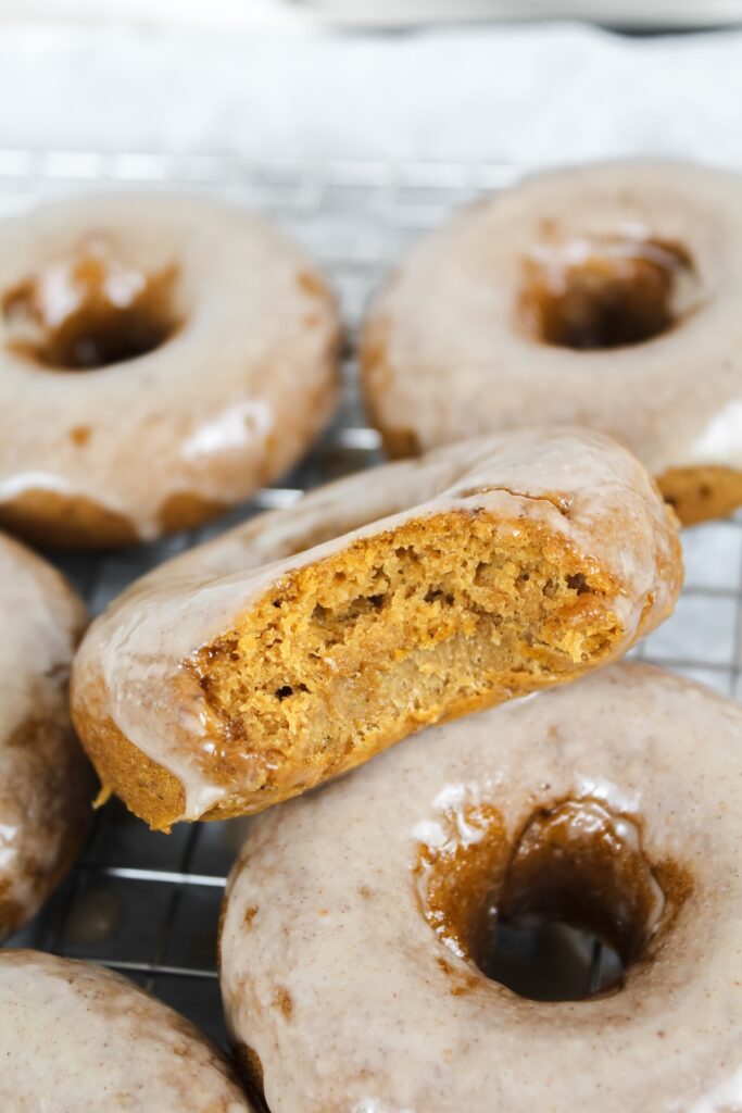 close up of a bite taken out of a donut