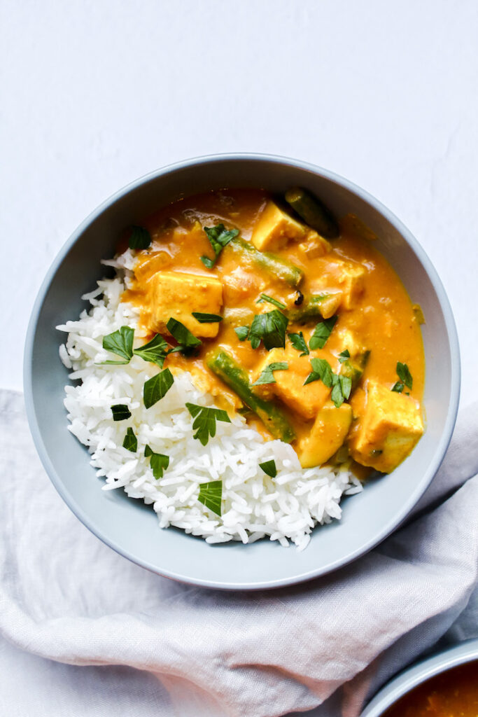 overview shot of a bowl of thai pumpkin curry